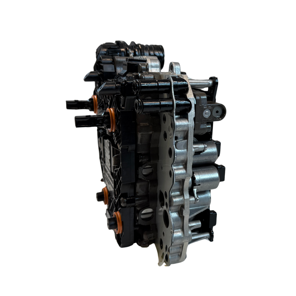 Close-up image of the identification and part number area on a 0BH mechatronic unit