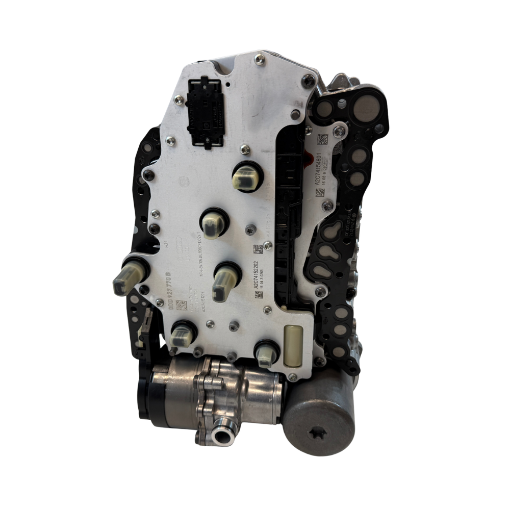 Top-side detail image of a 0DD DQ400e mechatronic unit with visible hydraulic and electronic sections