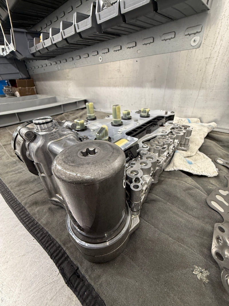 Eco Torque technician replacing gauze and solenoid to repair VW GTE 0DD DSG P288400 fault