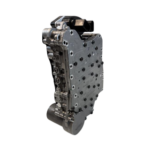 Close-up of the solenoid pack on a 0DD DQ400e mechatronic unit for hybrid DSG transmission repair